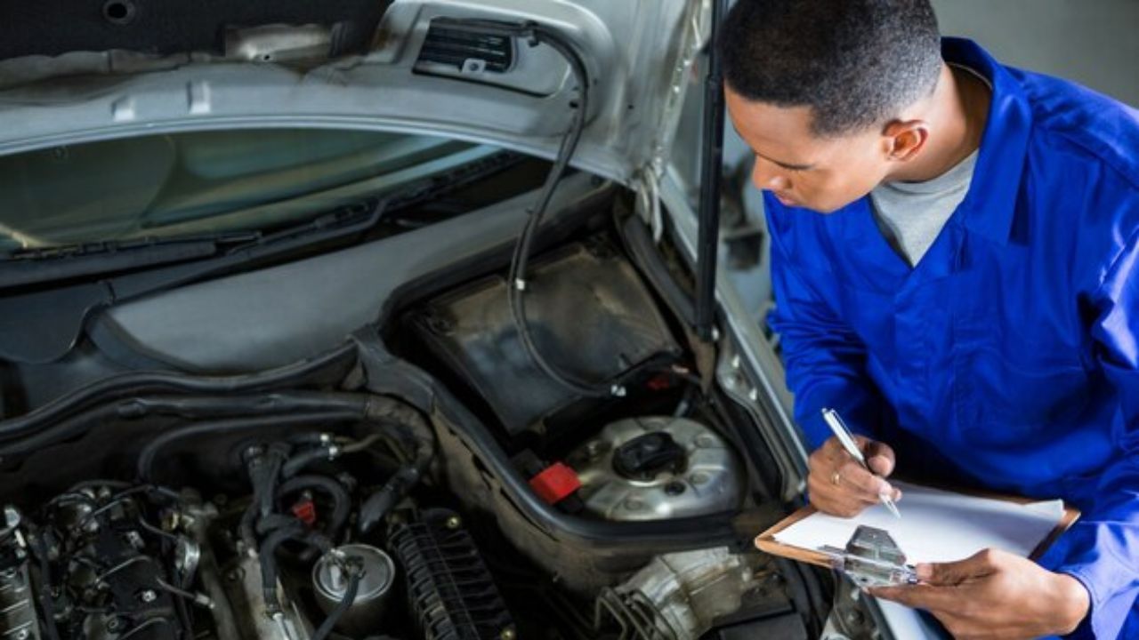 A professional carefully inspected a car
