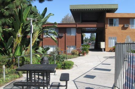 An exterior view of Stadium Arms Apartments