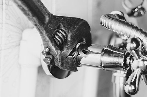 Faucets — Fixing a Faucet Using a Wrench in Bristol, TN