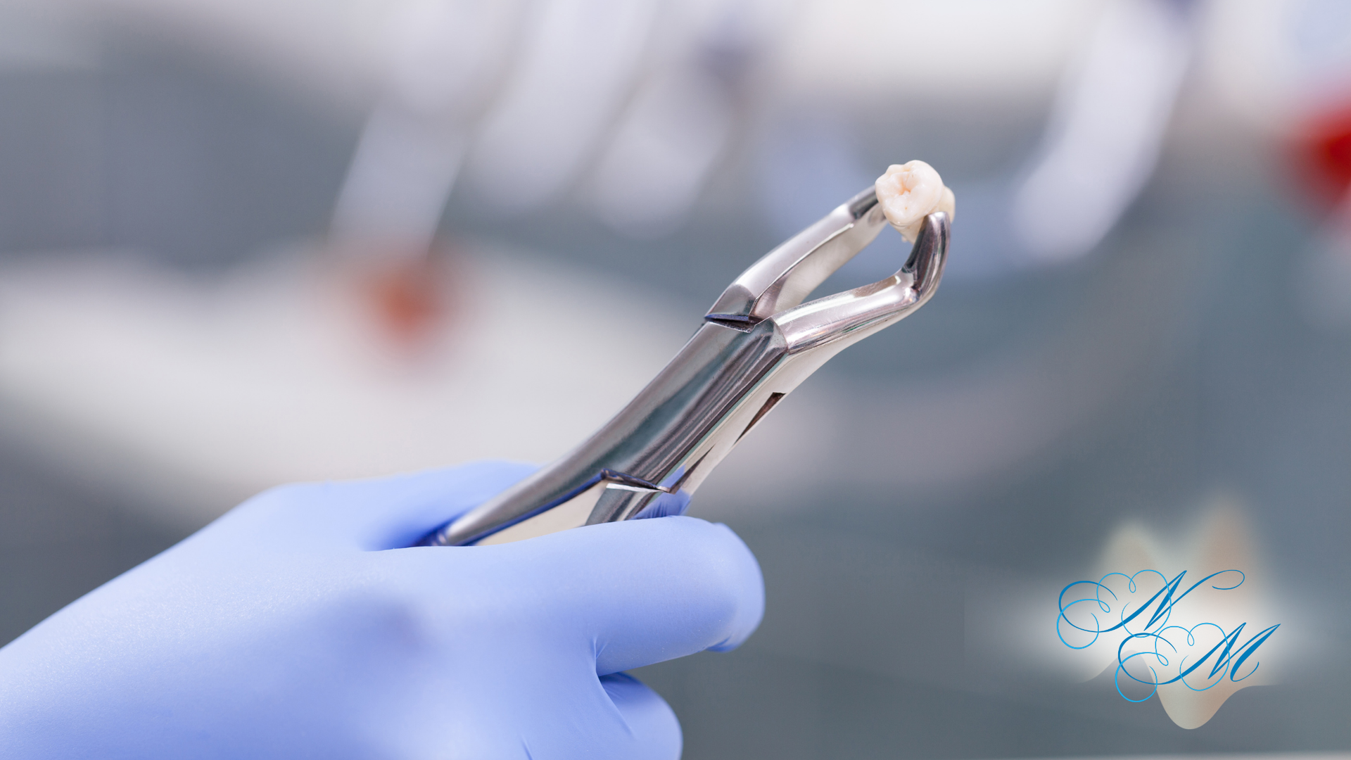 A person wearing blue gloves is holding a pair of dental pliers.