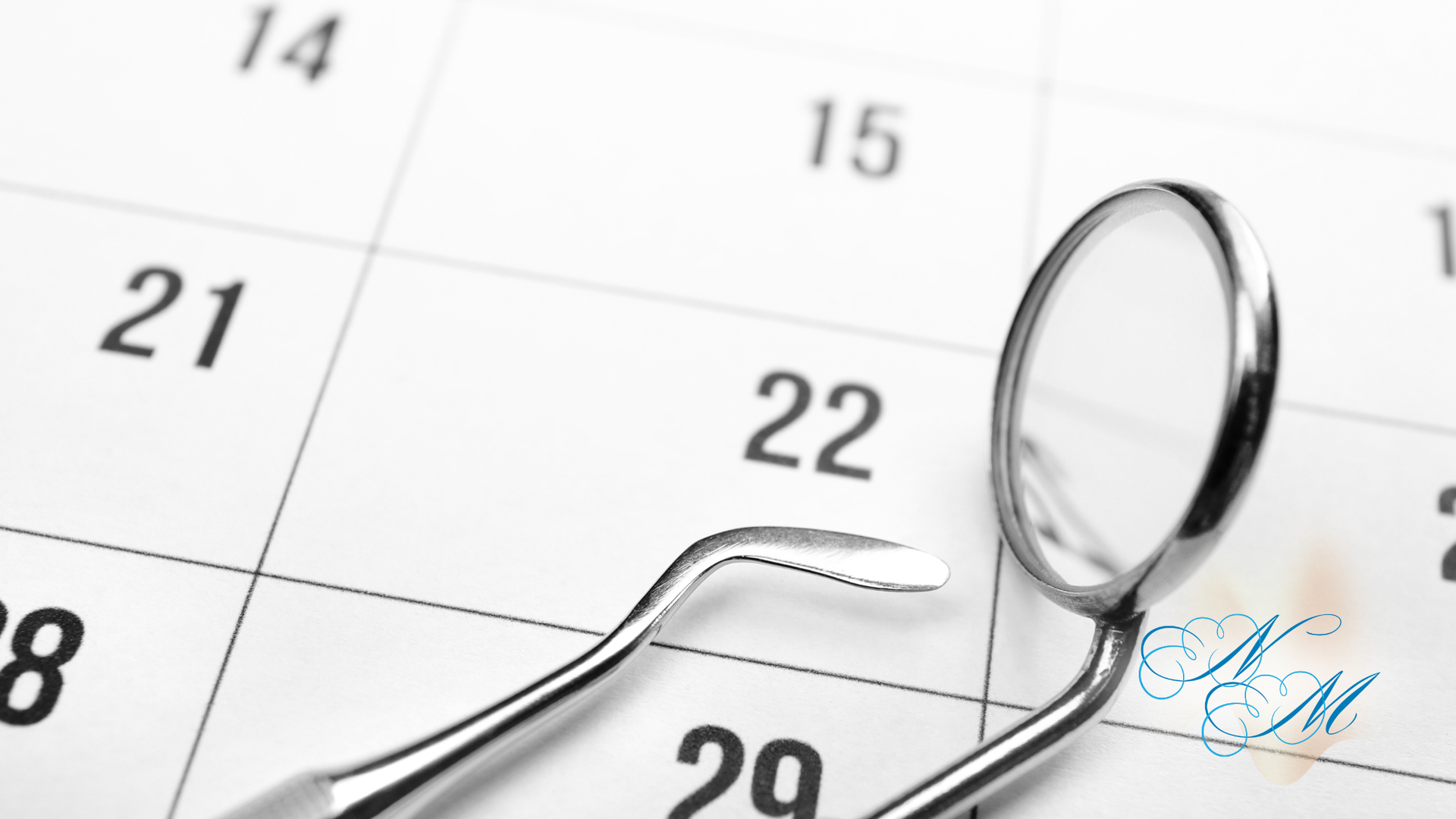 Dental tools on a calendar, highlighting the 22nd.