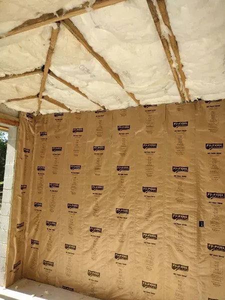A room with a lot of insulation on the walls and ceiling.