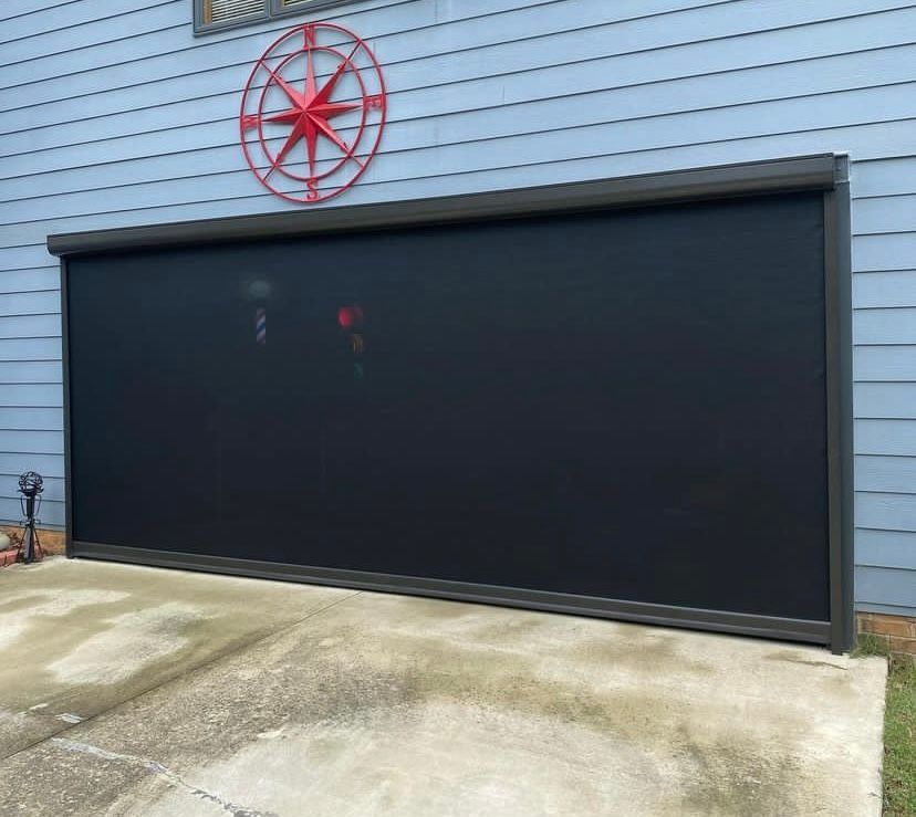 Screened-in patio attached to a two-story house