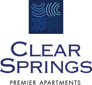 The clear springs premier apartments logo is blue and white.