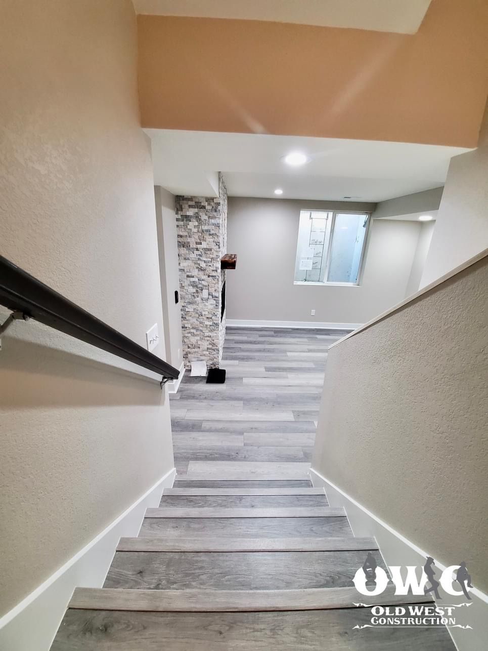 A set of stairs leading up to a room in a house.