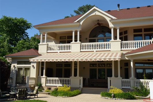 Striped awning for a home in Trumbull, CT