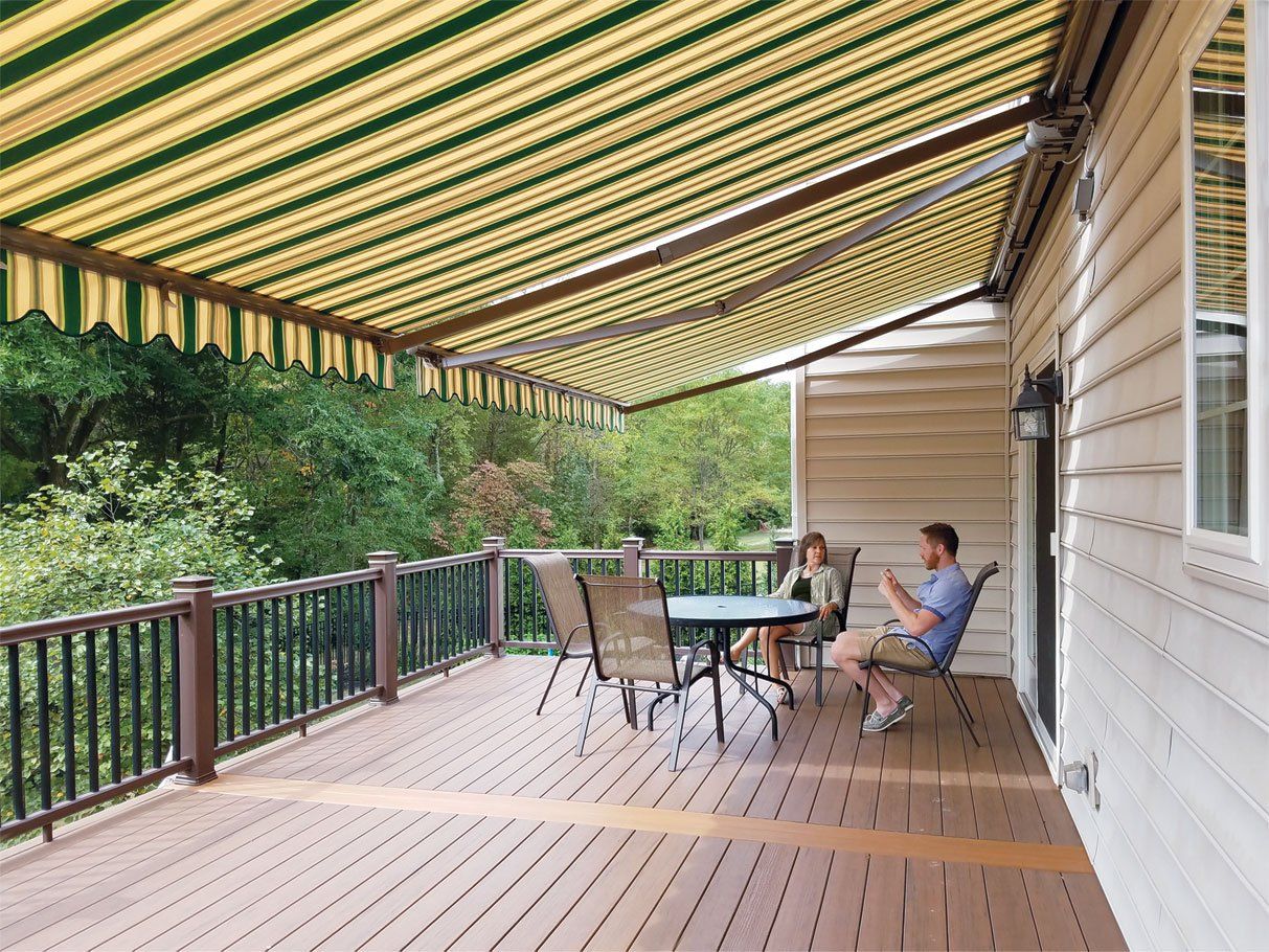 awning over deck with man reading