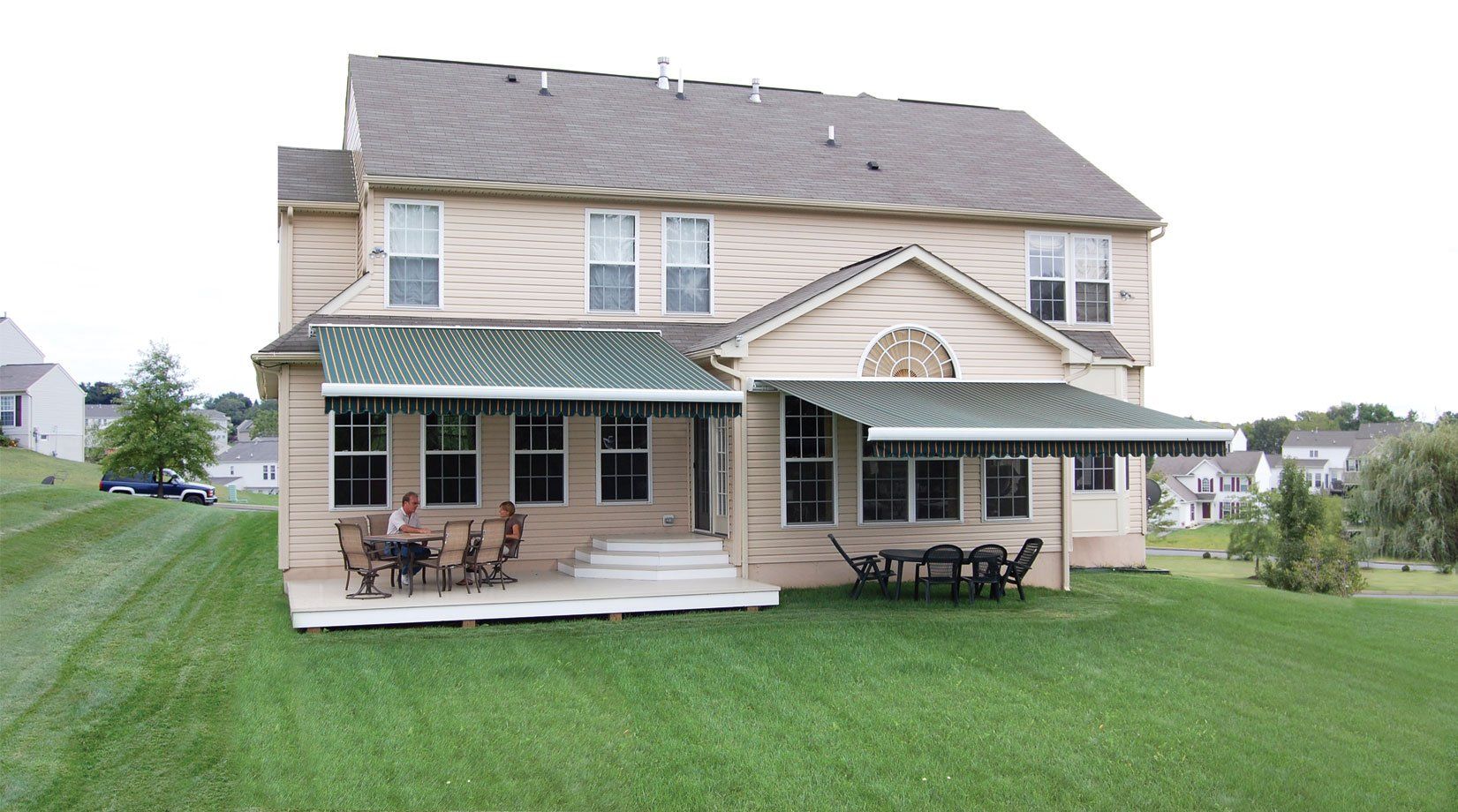 awnings over patio and lawn furniture