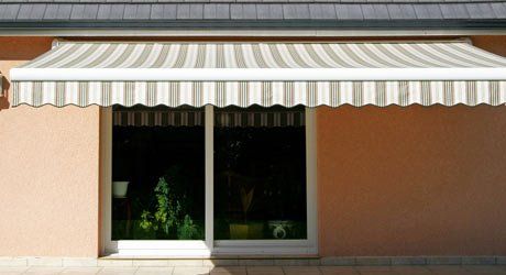 Striped awning for a home in Trumbull, CT