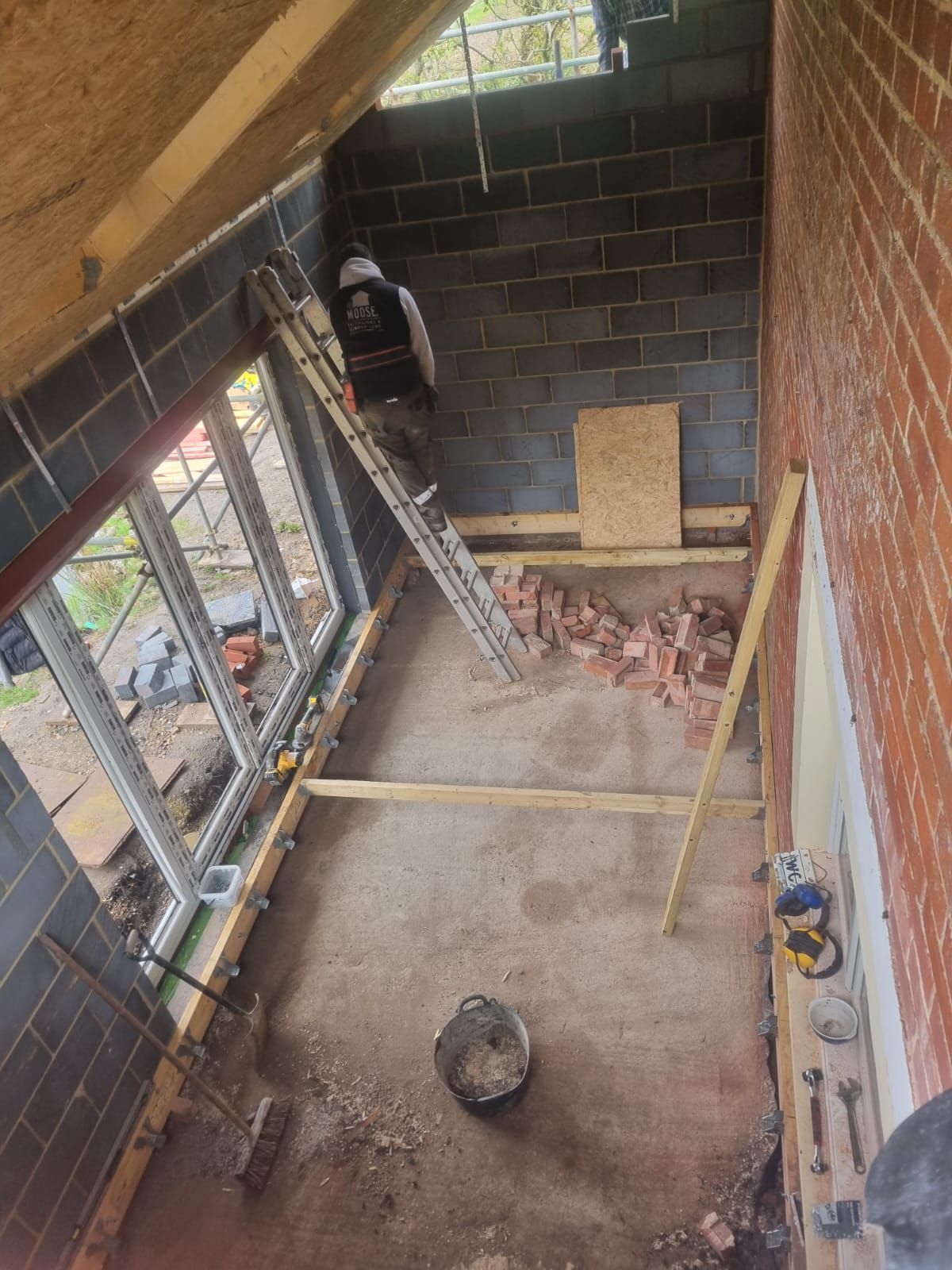 An aerial view of a building under construction.