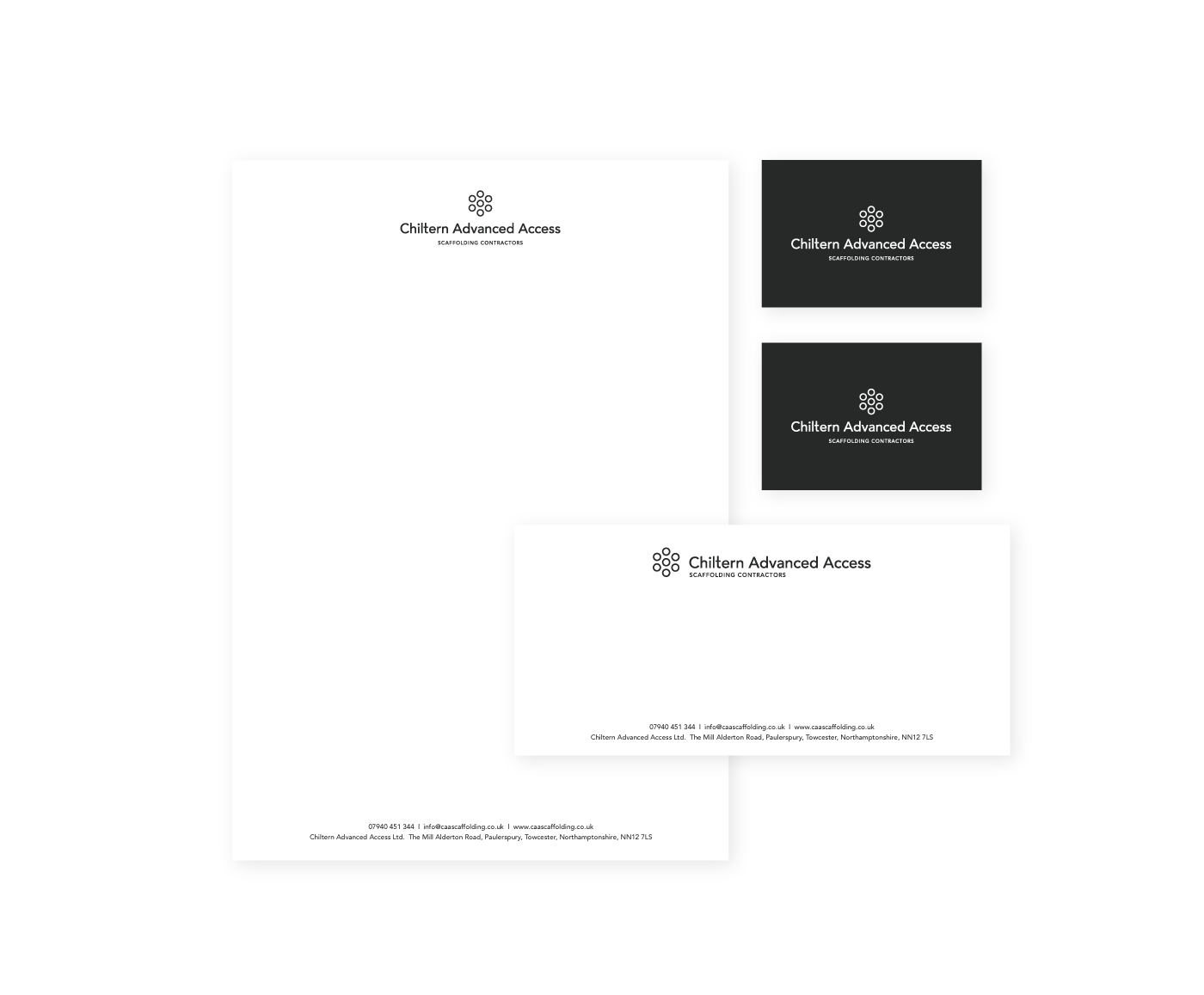 A set of letters and business cards for a company