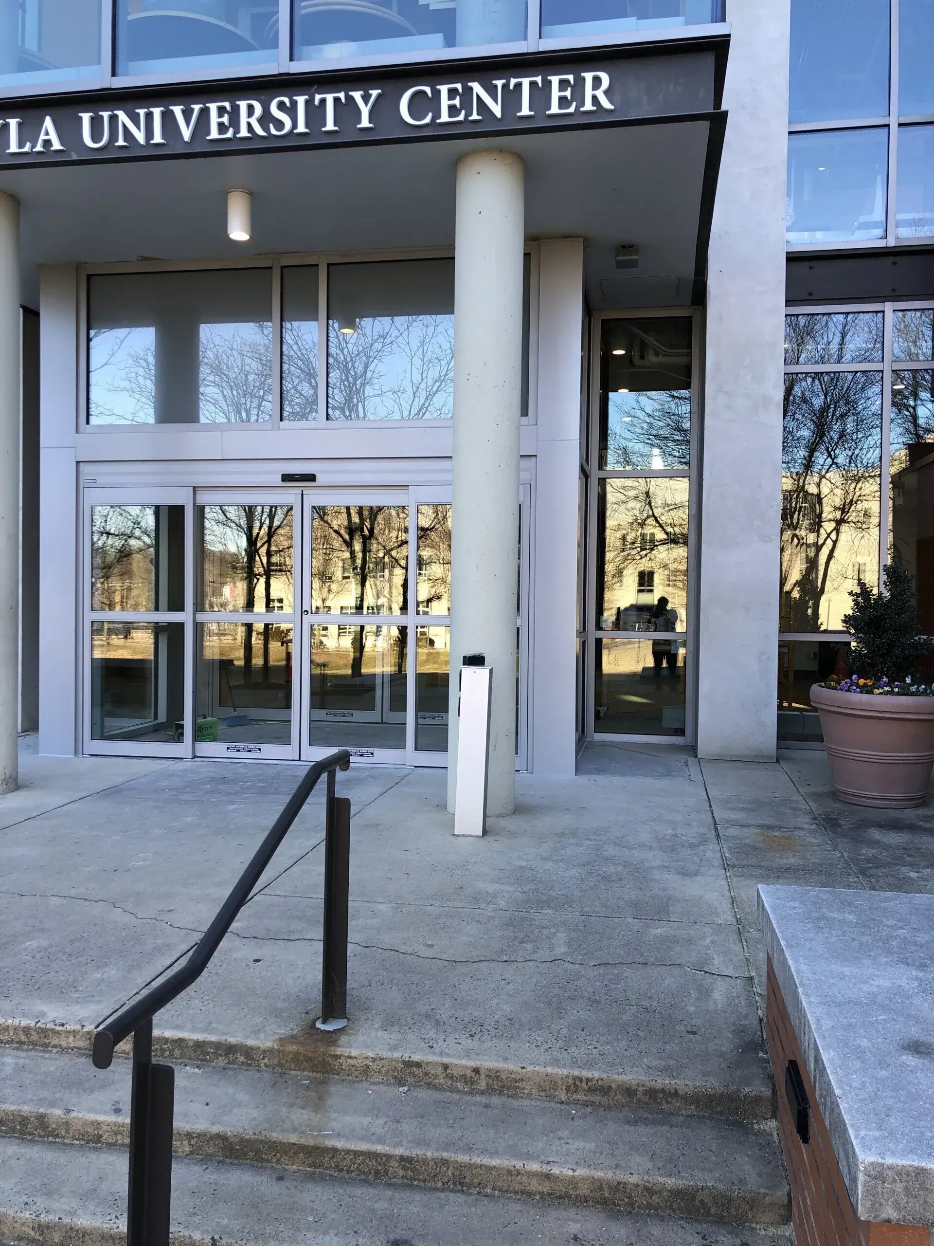 The entrance to the la university center with stairs leading up to it