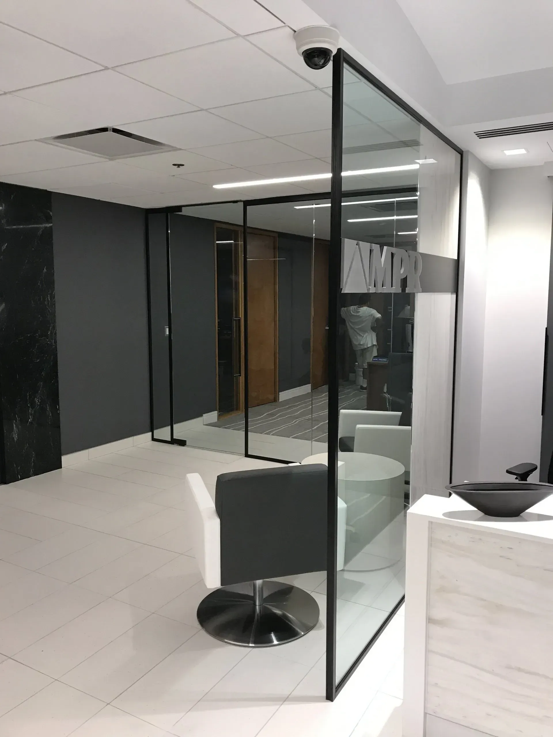 A room with a chair and a sign that says ' yacht ' on it