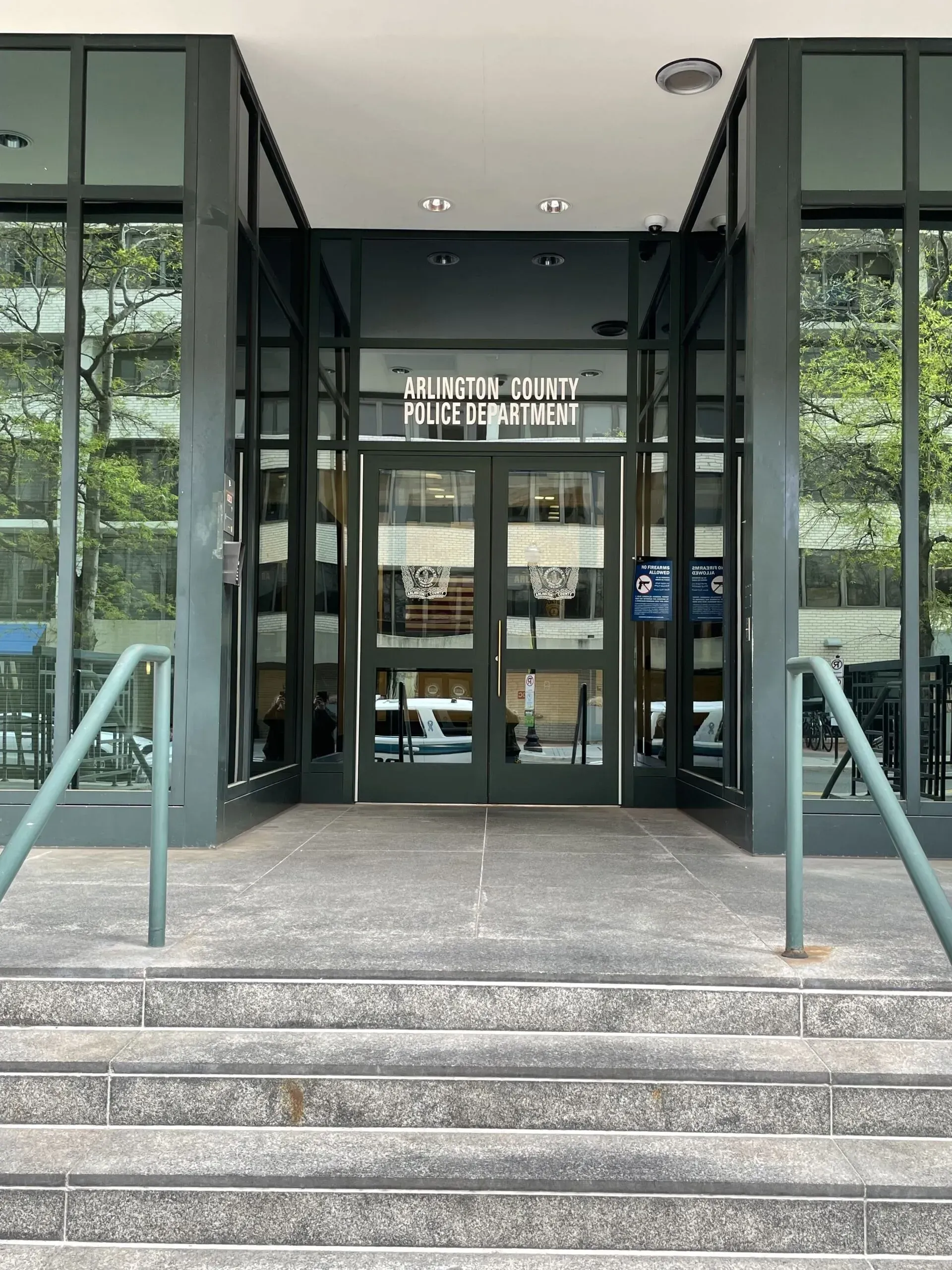 The entrance to a building with stairs leading up to it