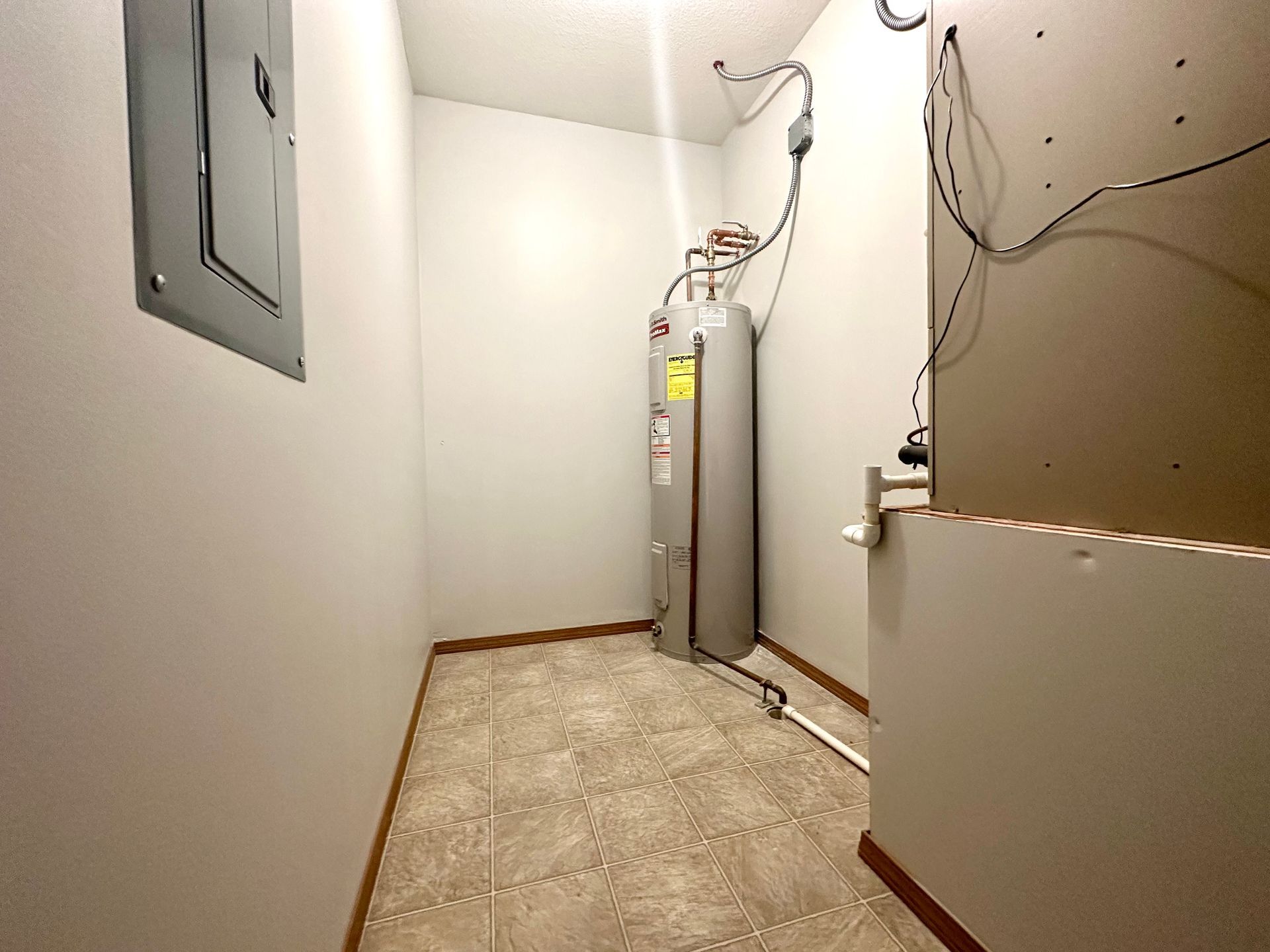 there is a water heater in the middle of the room .