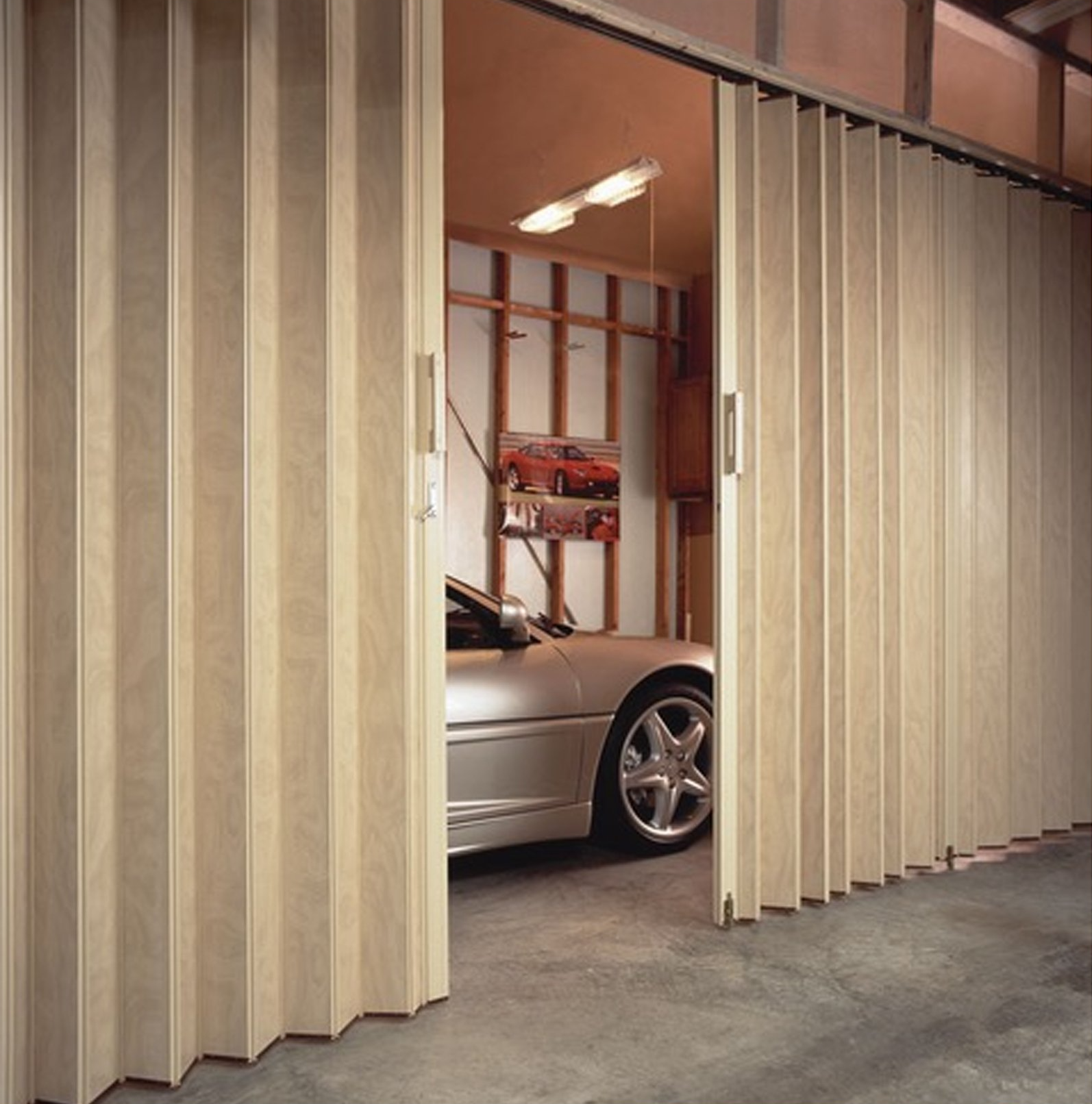 Car In The Room With Accordion Doors — Rockland, MA — Allied Products Group