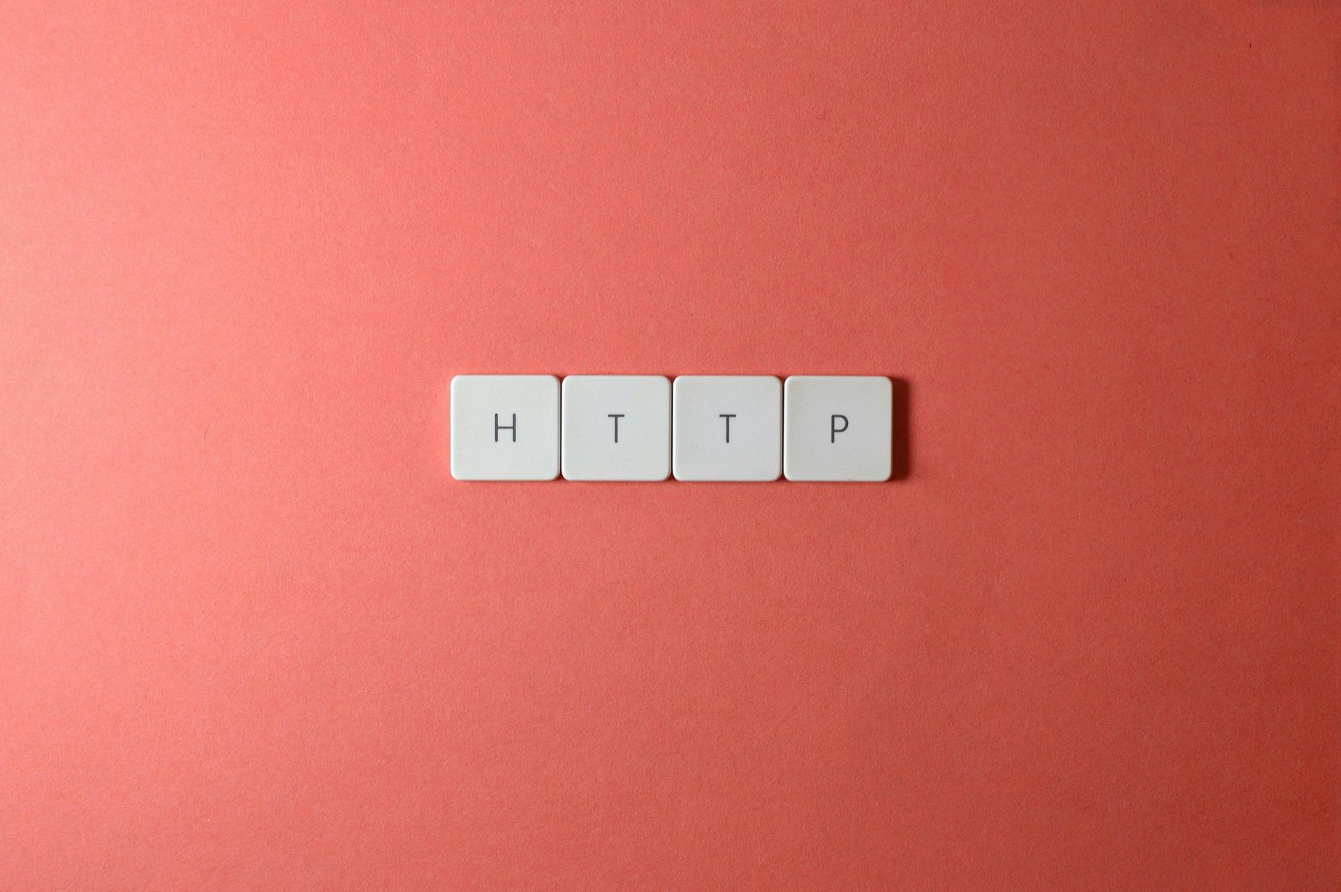 Four computer keys spelling 