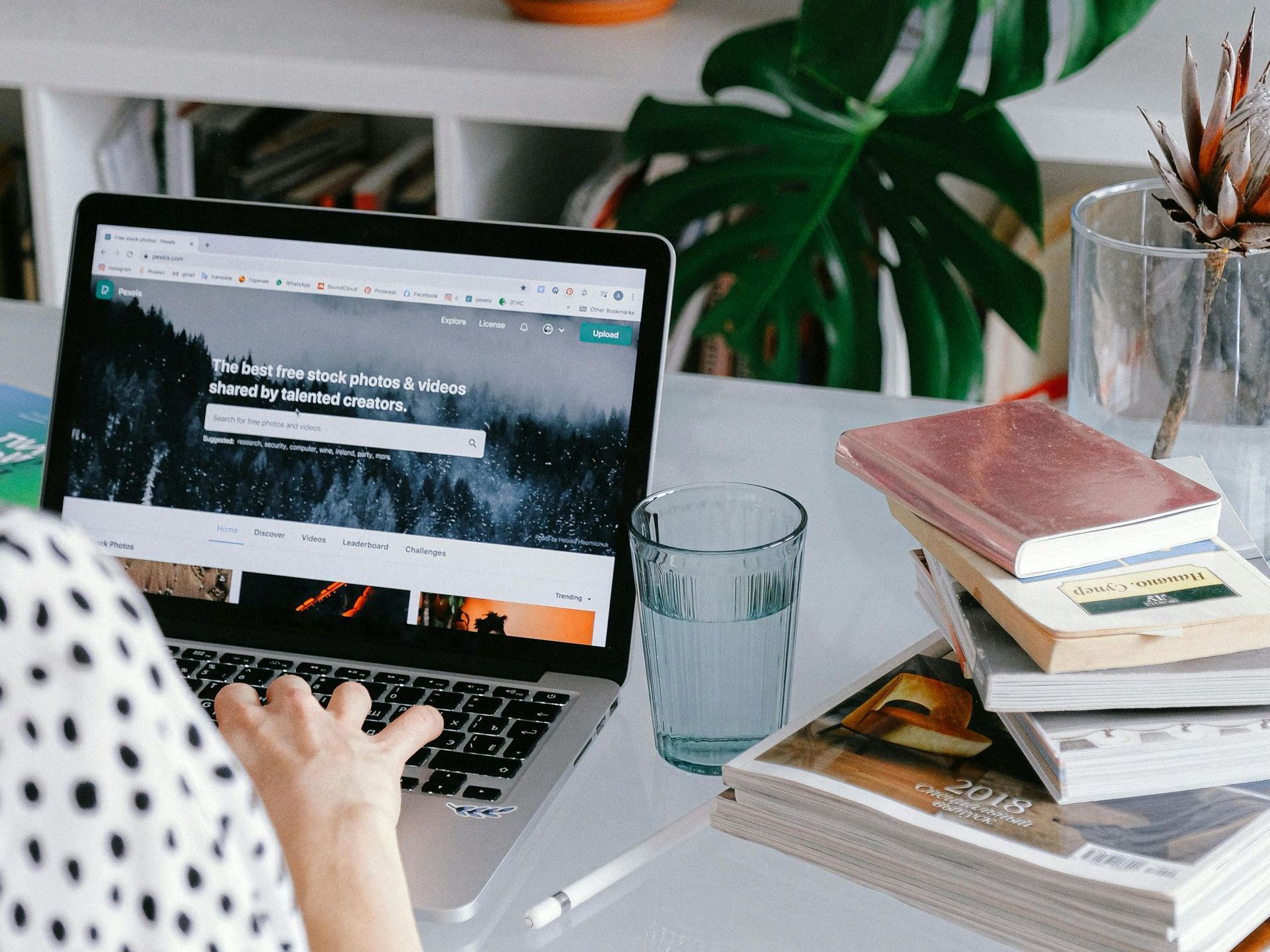 Person working at a desk on their New website creation and website refresh in Toronto 