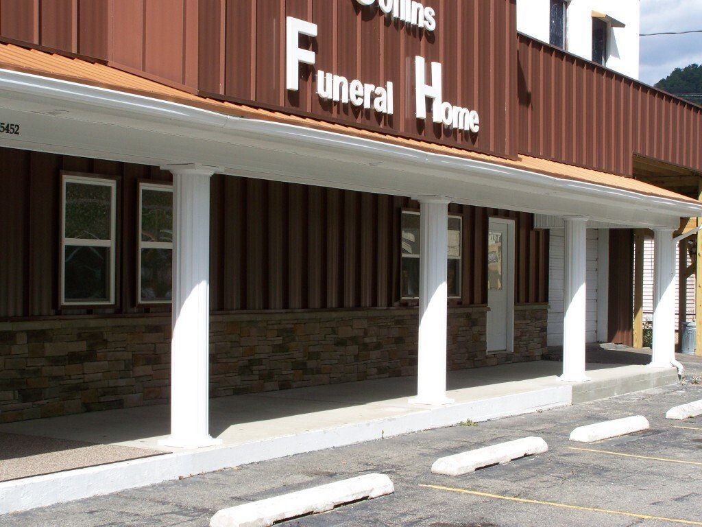 A brown building with the word funeral home on it