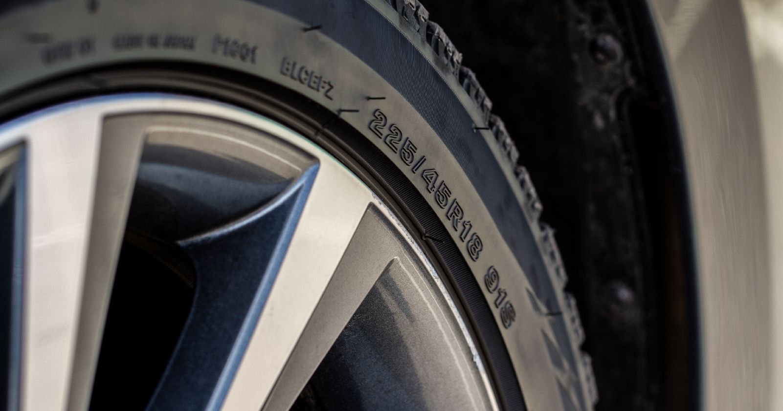 a close up of a tire on a car wheel to accompany an article about car tire sizes