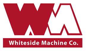 A red and white logo for whiteside machine co.