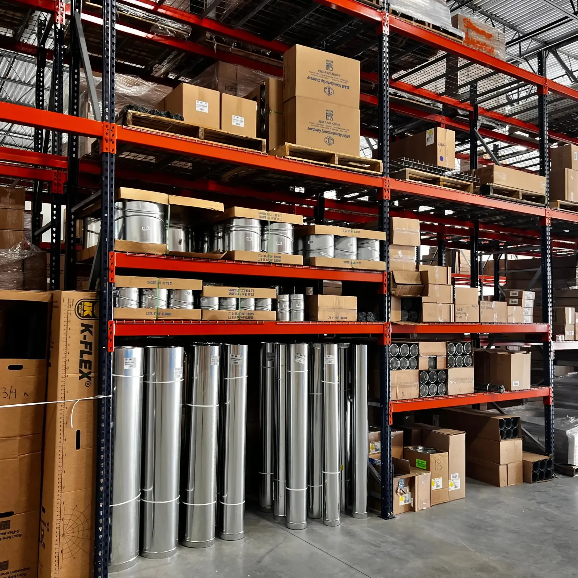 Raymond Lopez Services, LLC. Heating & Air - A warehouse filled with lots of boxes including one that says o-flex