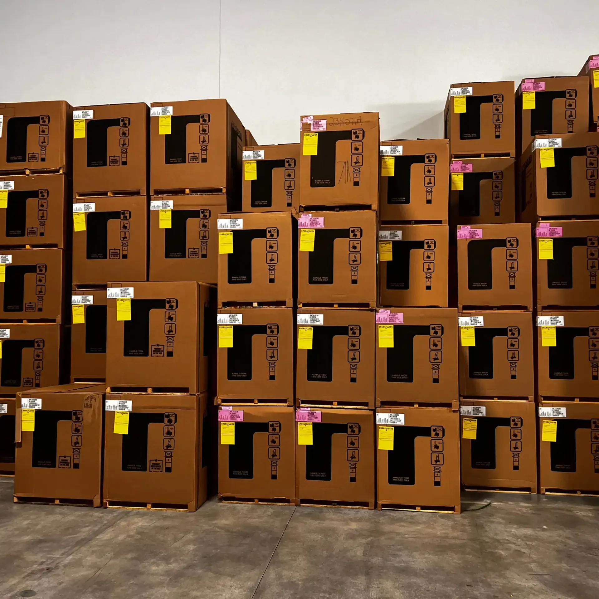 Raymond Lopez Services, LLC. Heating & Air - A large stack of boxes with the letter t on them