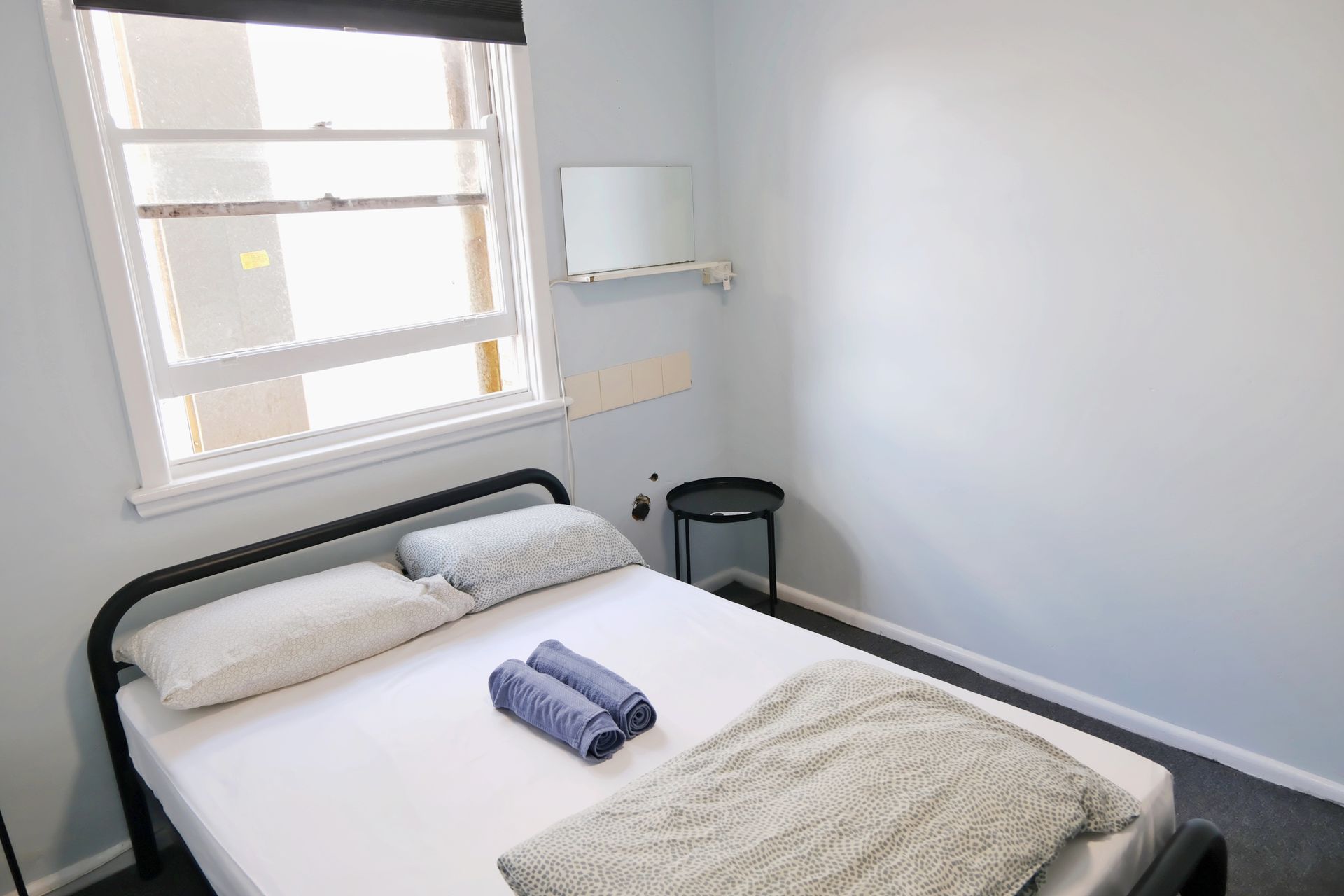 double bed at pint on punt backpackers