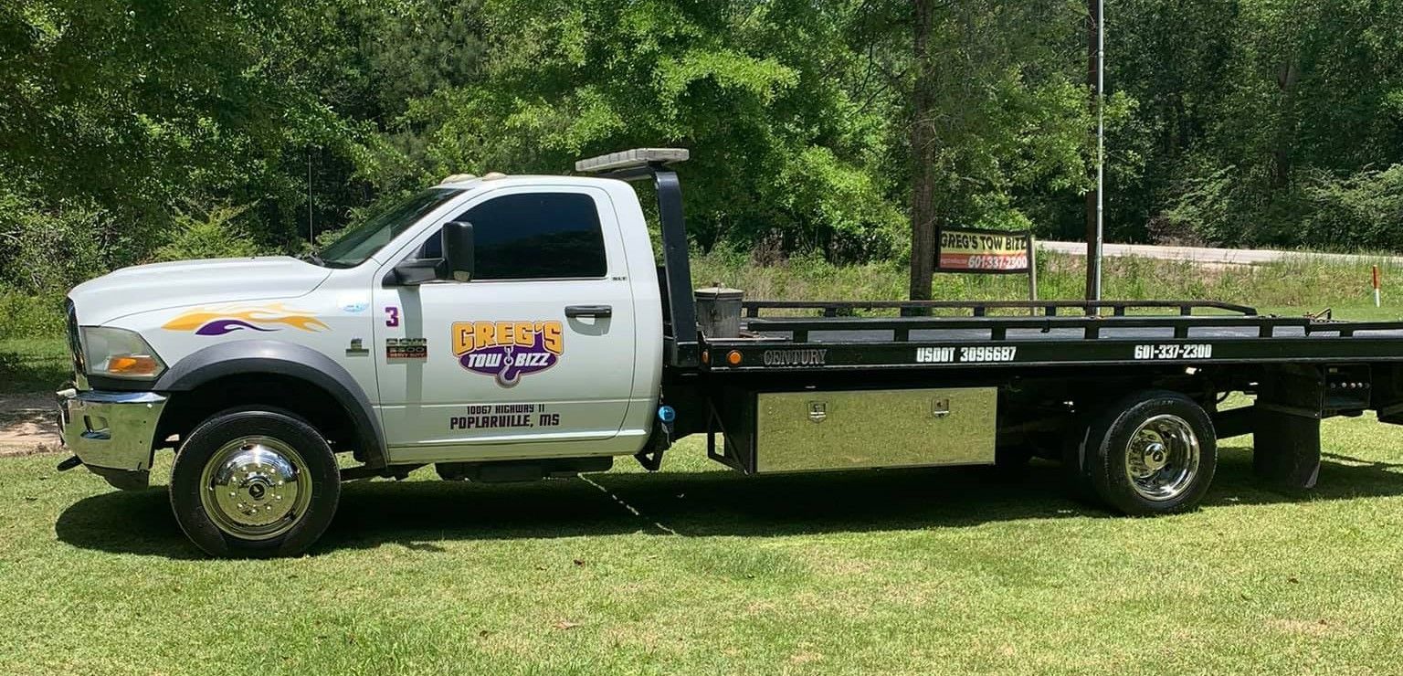 Greg's Tow Bizz Tow Truck