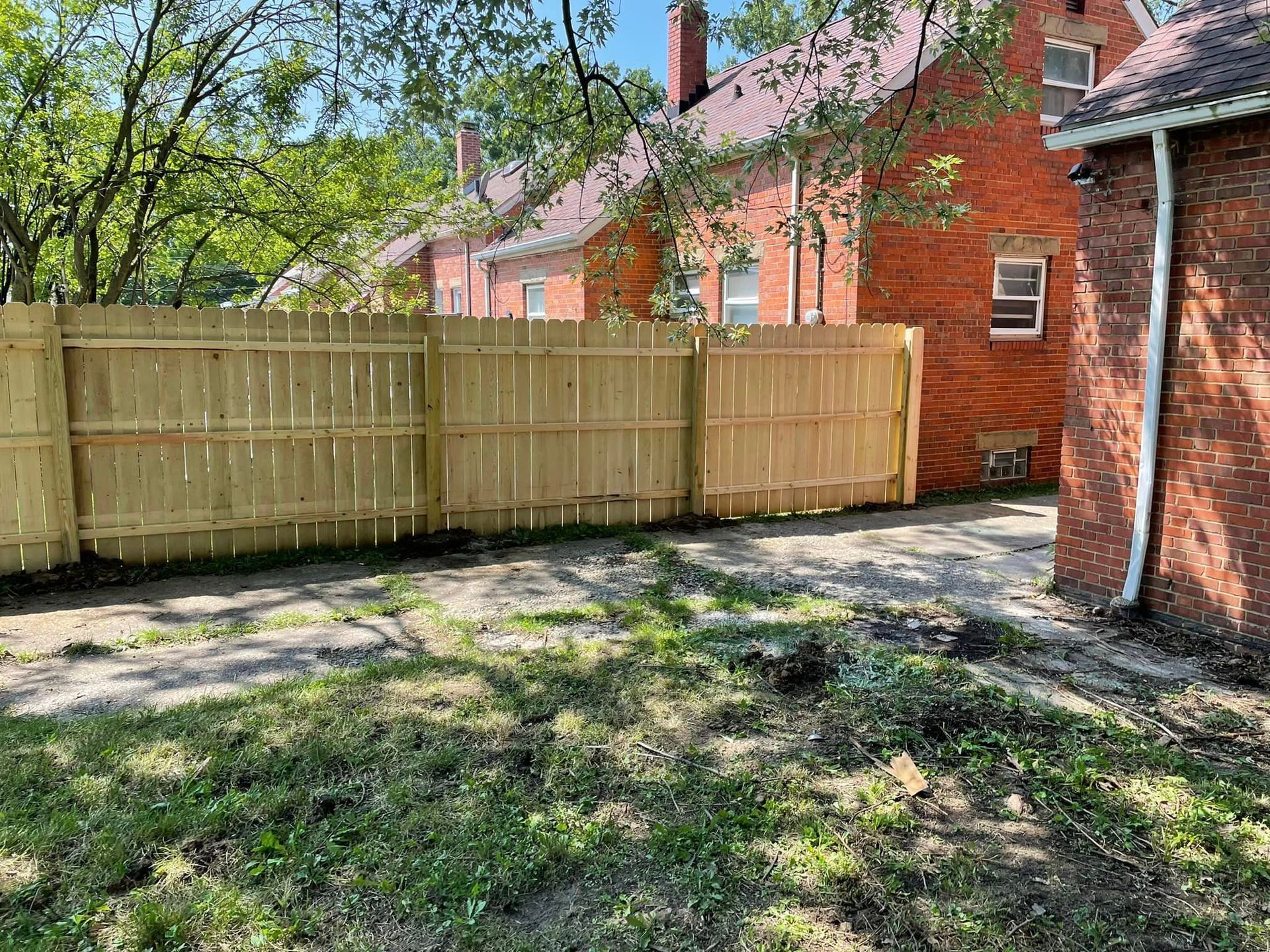 A bathroom with a sink , toilet and shower.