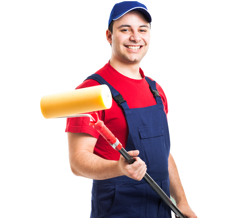 A man in overalls is holding a paint roller