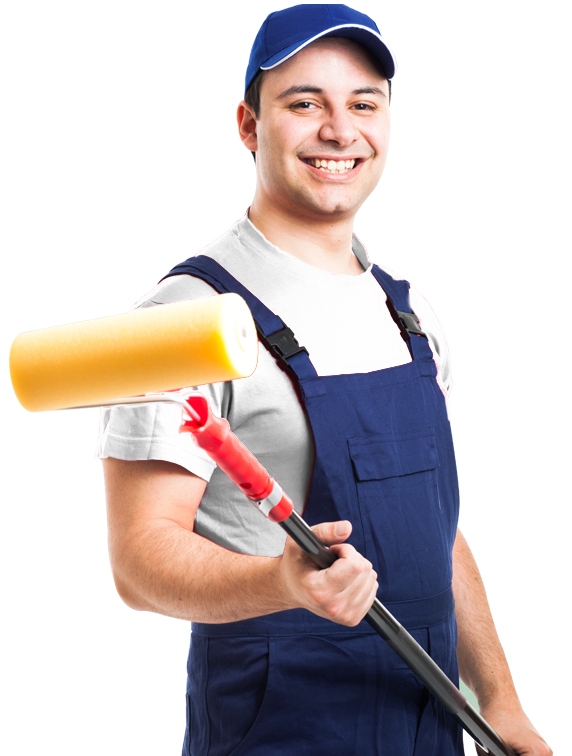 A man in overalls is holding a paint roller
