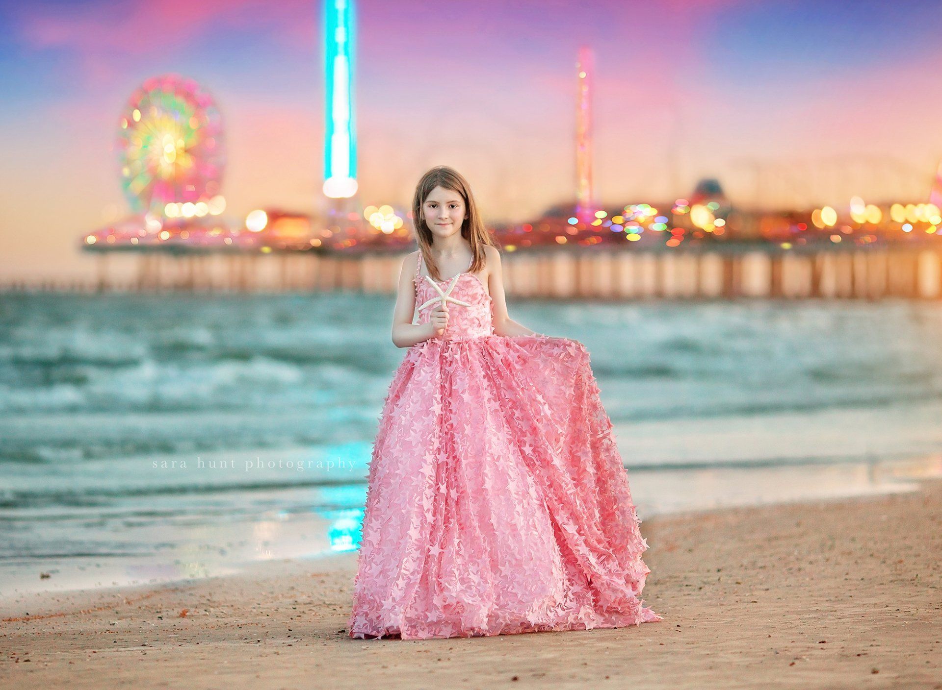 Tall girl holding a starfish — Pearland, TX — Sara Hunt Photography