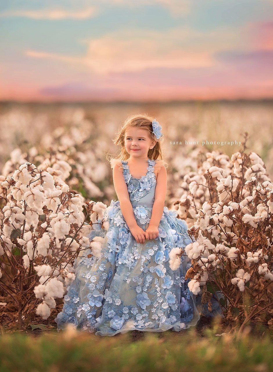 Girl in blue dress smiling — Pearland, TX — Sara Hunt Photography