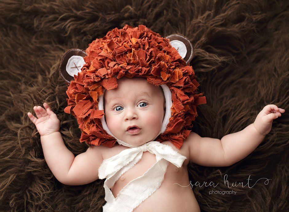 Baby boy wearing lion bonnet — Pearland, TX — Sara Hunt Photography Baby boy wearing lion bonnet — Pearland, TX — Sara Hunt Photography