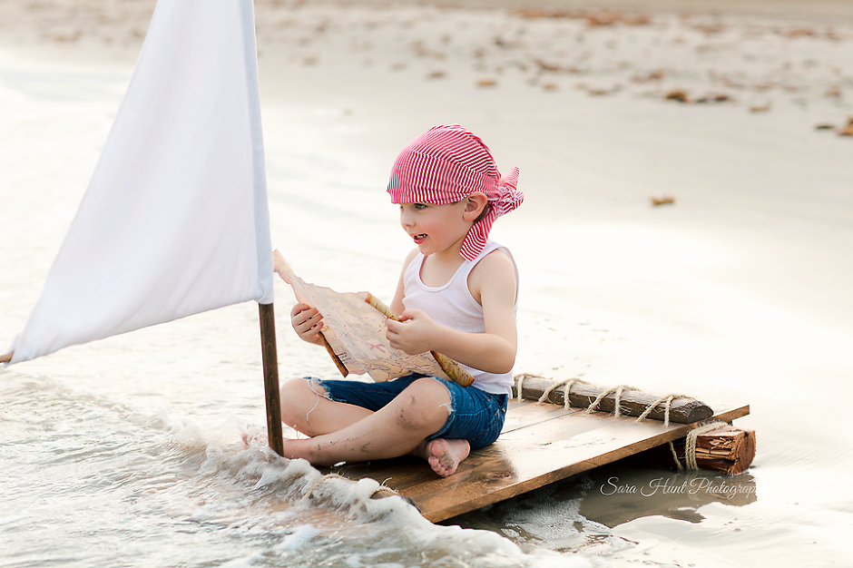 Boy pirate holding a map — Pearland, TX — Sara Hunt Photography