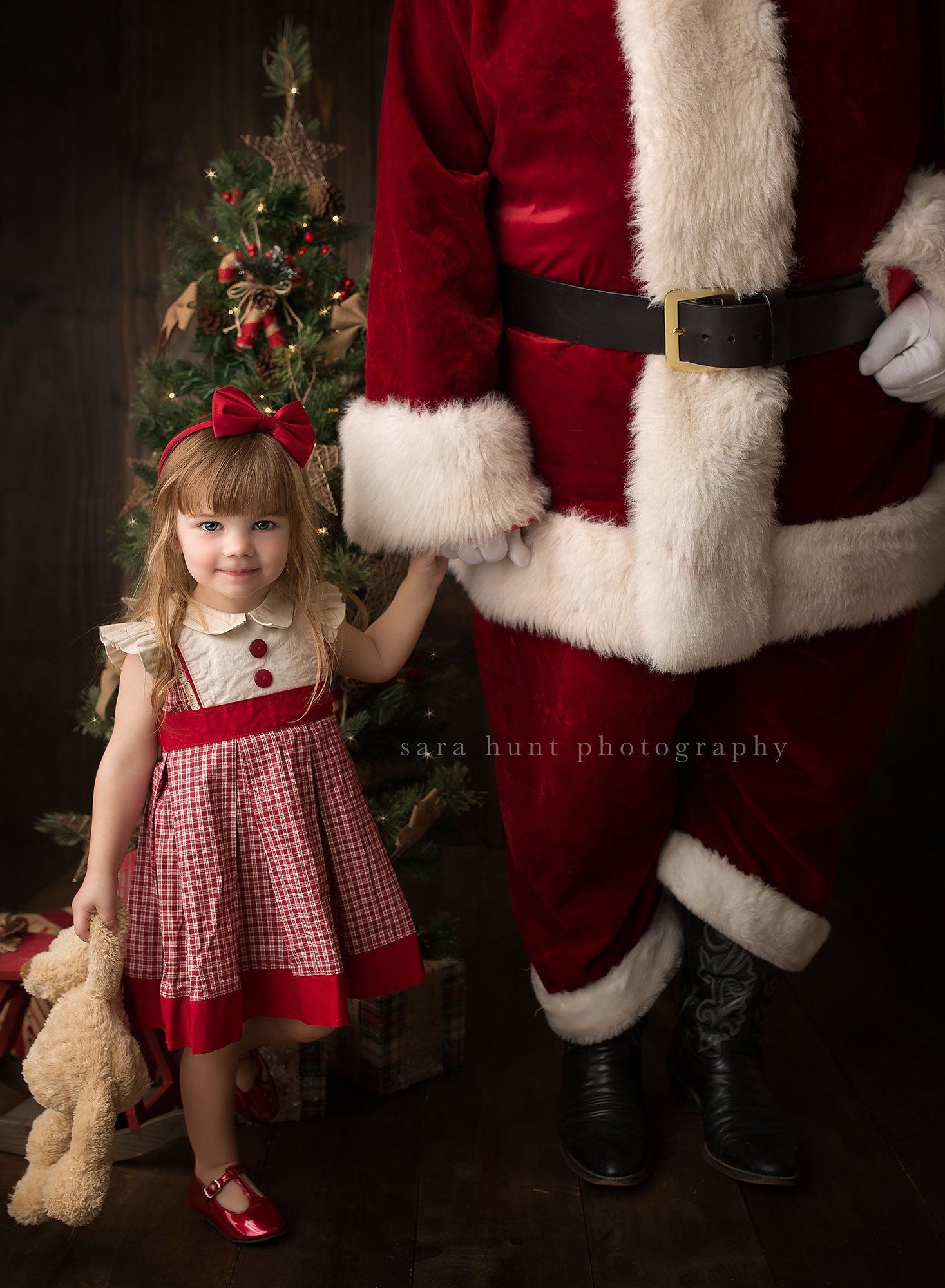 Little girl a teddy bear and Santa's hand — Pearland, TX — Sara Hunt Photography