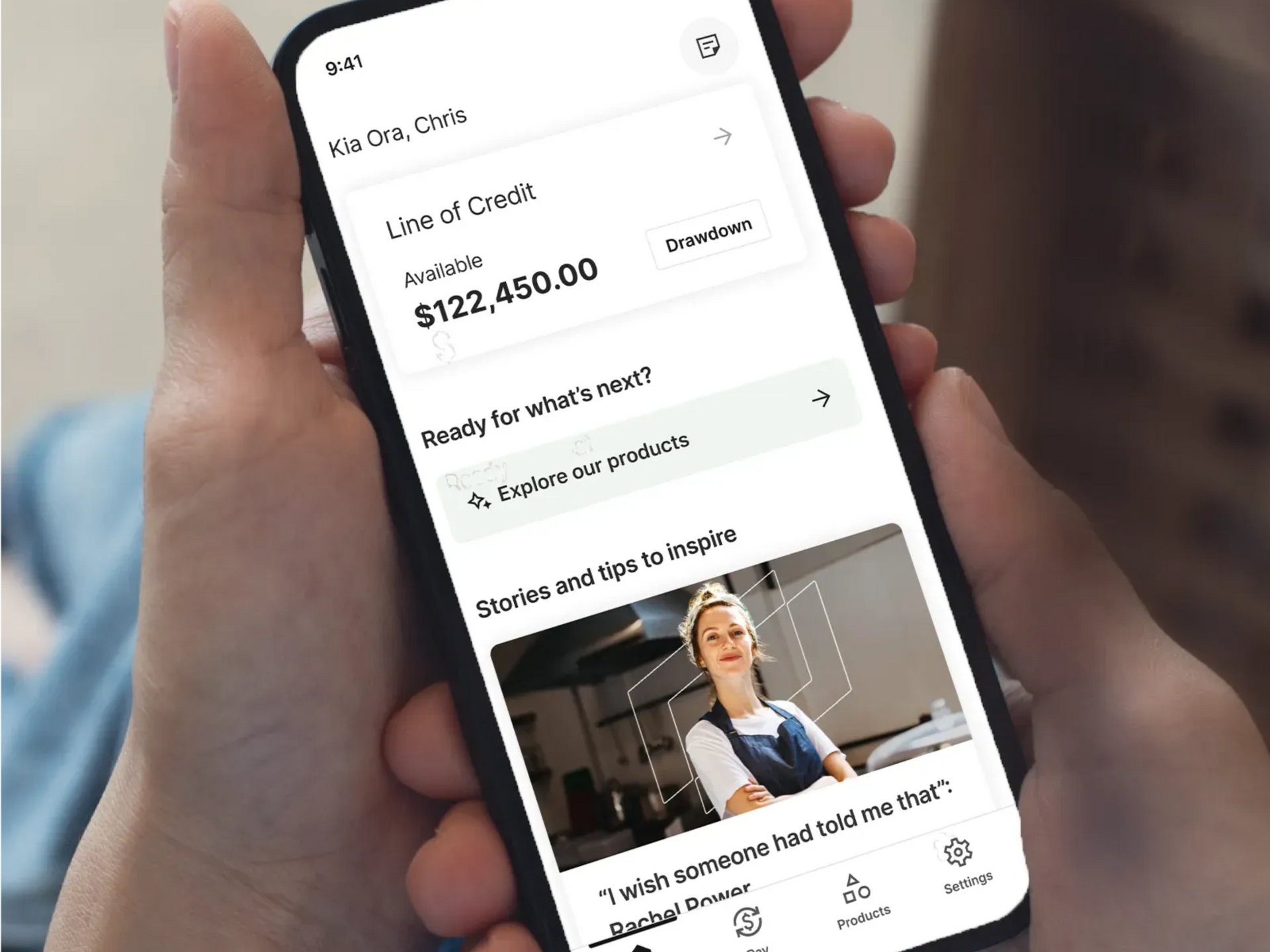 Walking down the street with coffee.