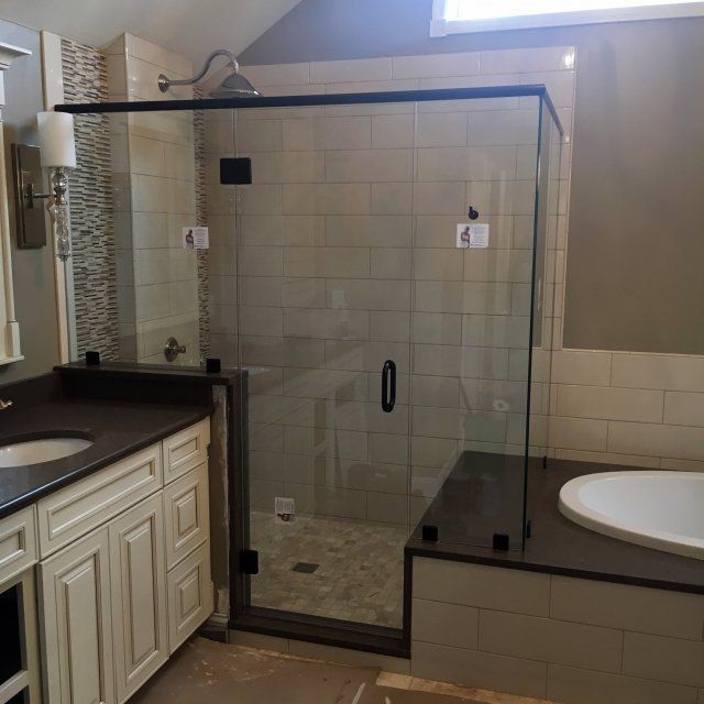 Window Installation — Bathroom with a huge Glass Enclosure In Columbus, IN