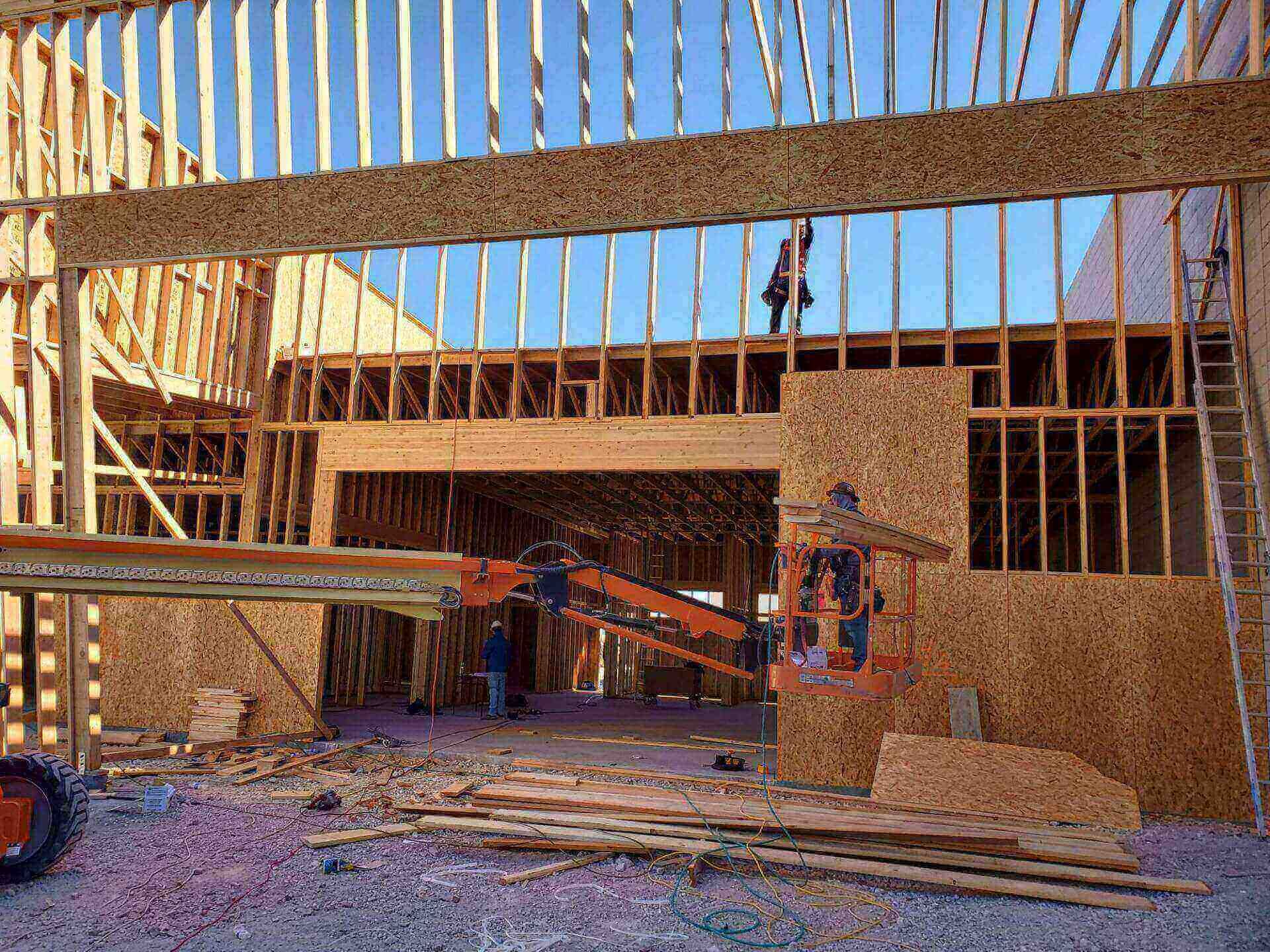 Architect Looking Over Blueprints at Home Construction Site — Las Vegas, NV — Hercules Enterprises LLC