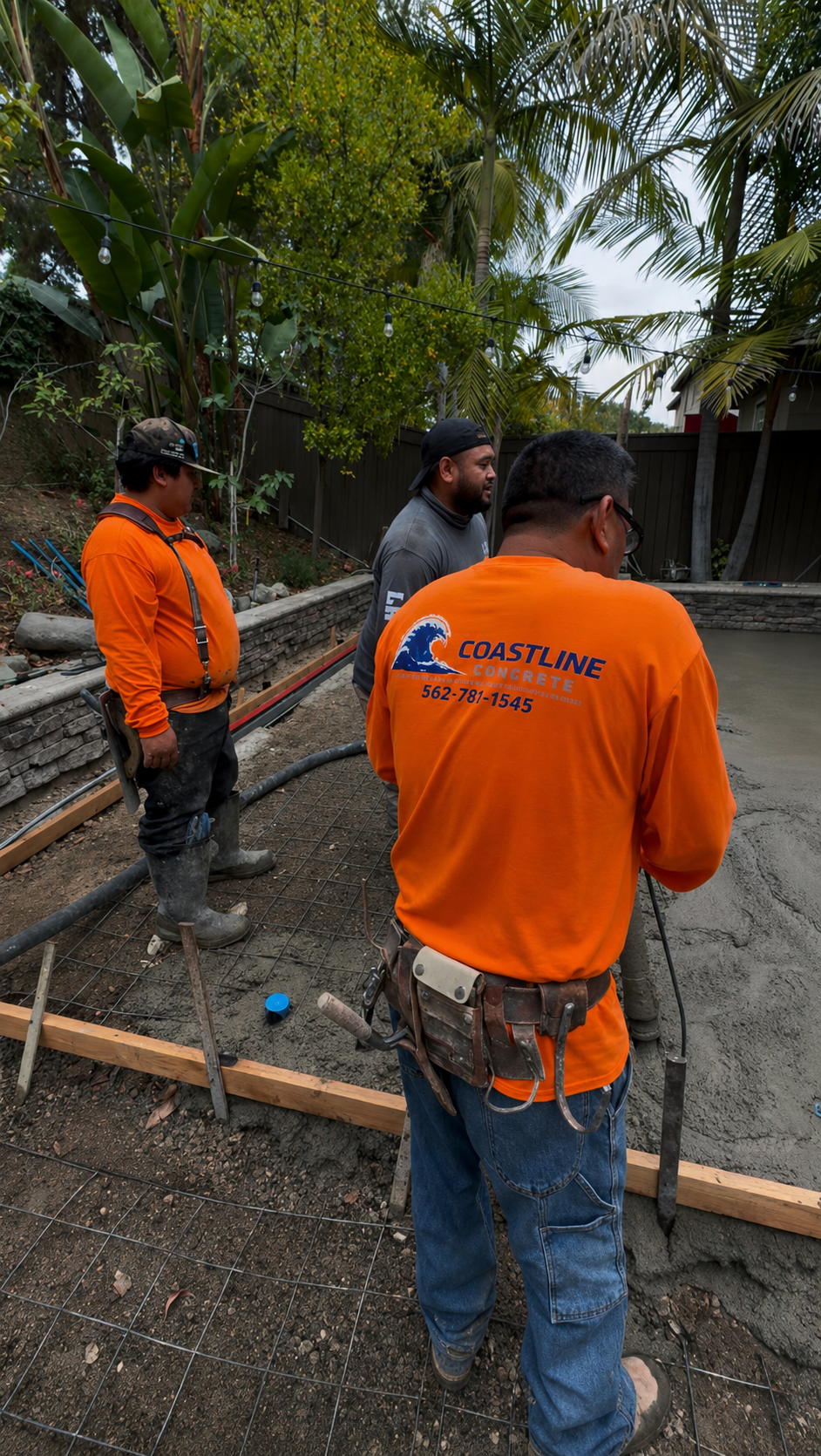 Coastline Concrete crew installing residential concrete in Orange County.