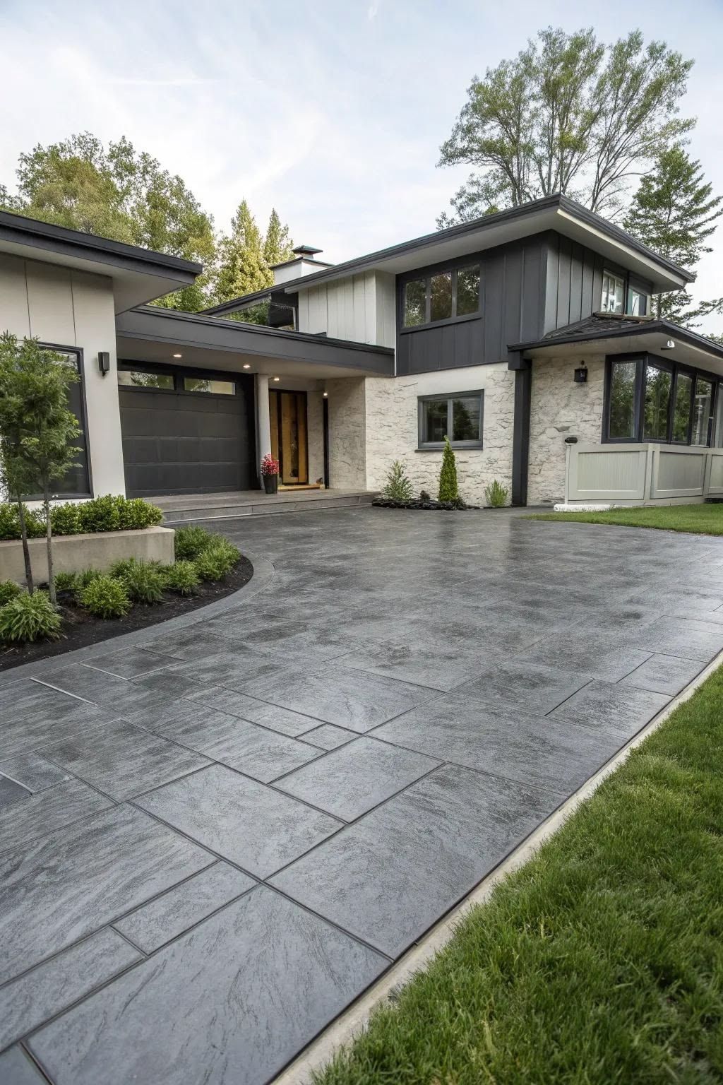 Decorative stamped concrete driveway installed by Coastline Concrete in Orange County, California.