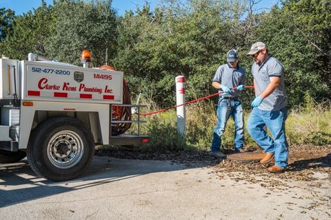 Repairs — Men Preparing to Pump Sewage Pipe in Austin, TX