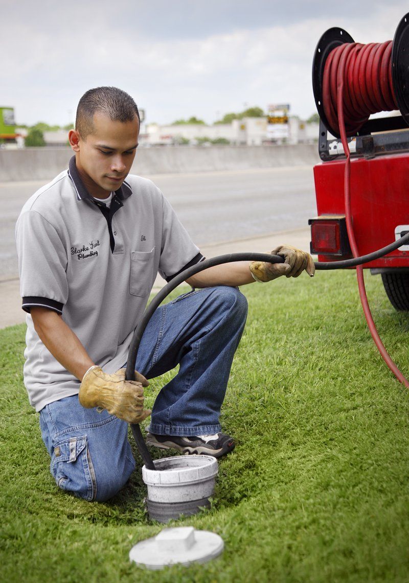 Hydro Jetting Service — Man Cleaning Grease Oil  in Austin, TX
