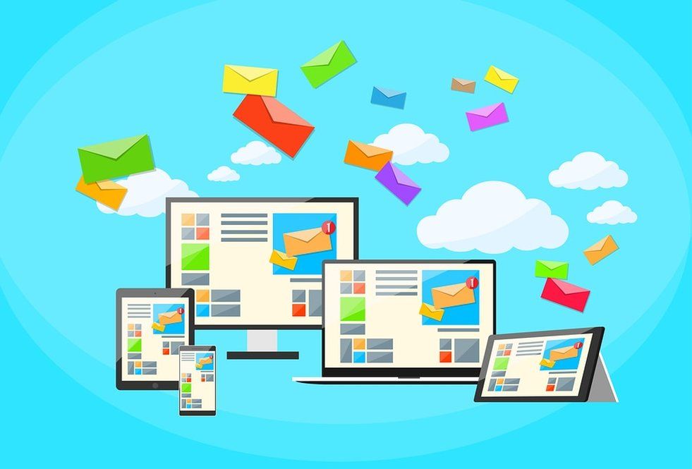 Bright illustration of envelopes in clouds above multiple screen types symbolising email campaign software