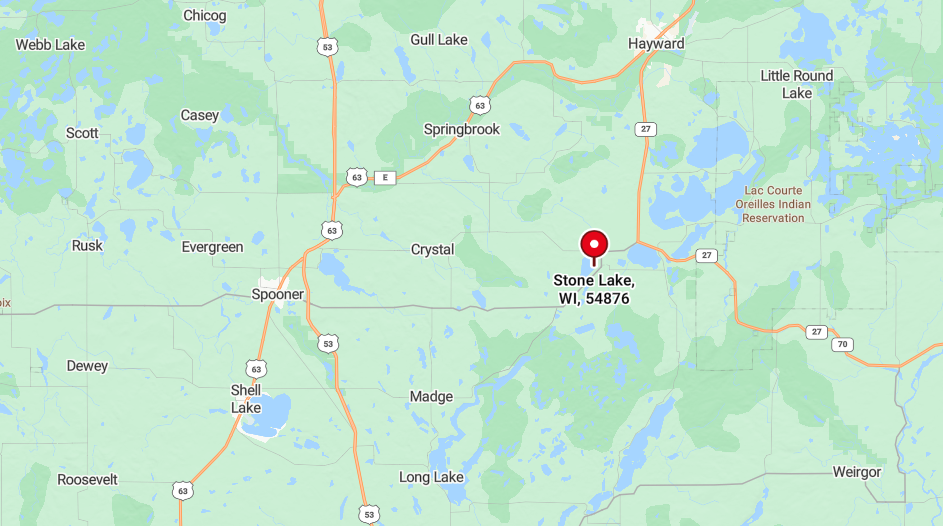 A digital map shows the location of Birchwood, Wisconsin, marked with a red pin, surrounded by several small lakes.