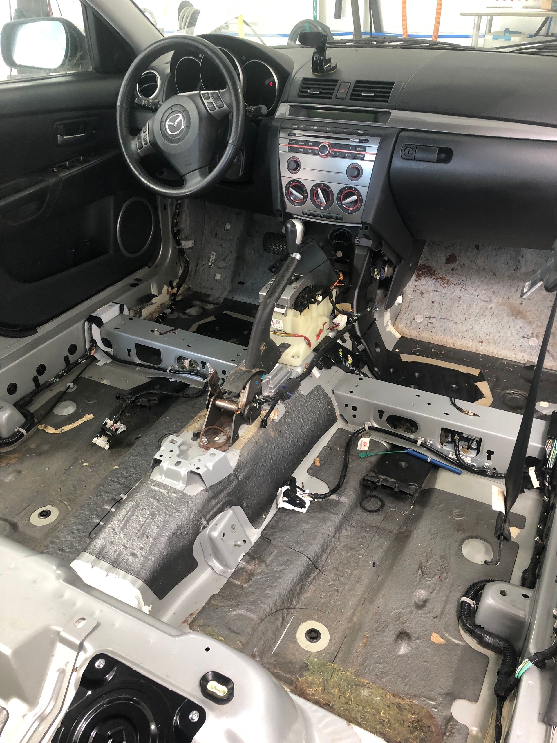 The interior of a car is being dismantled.