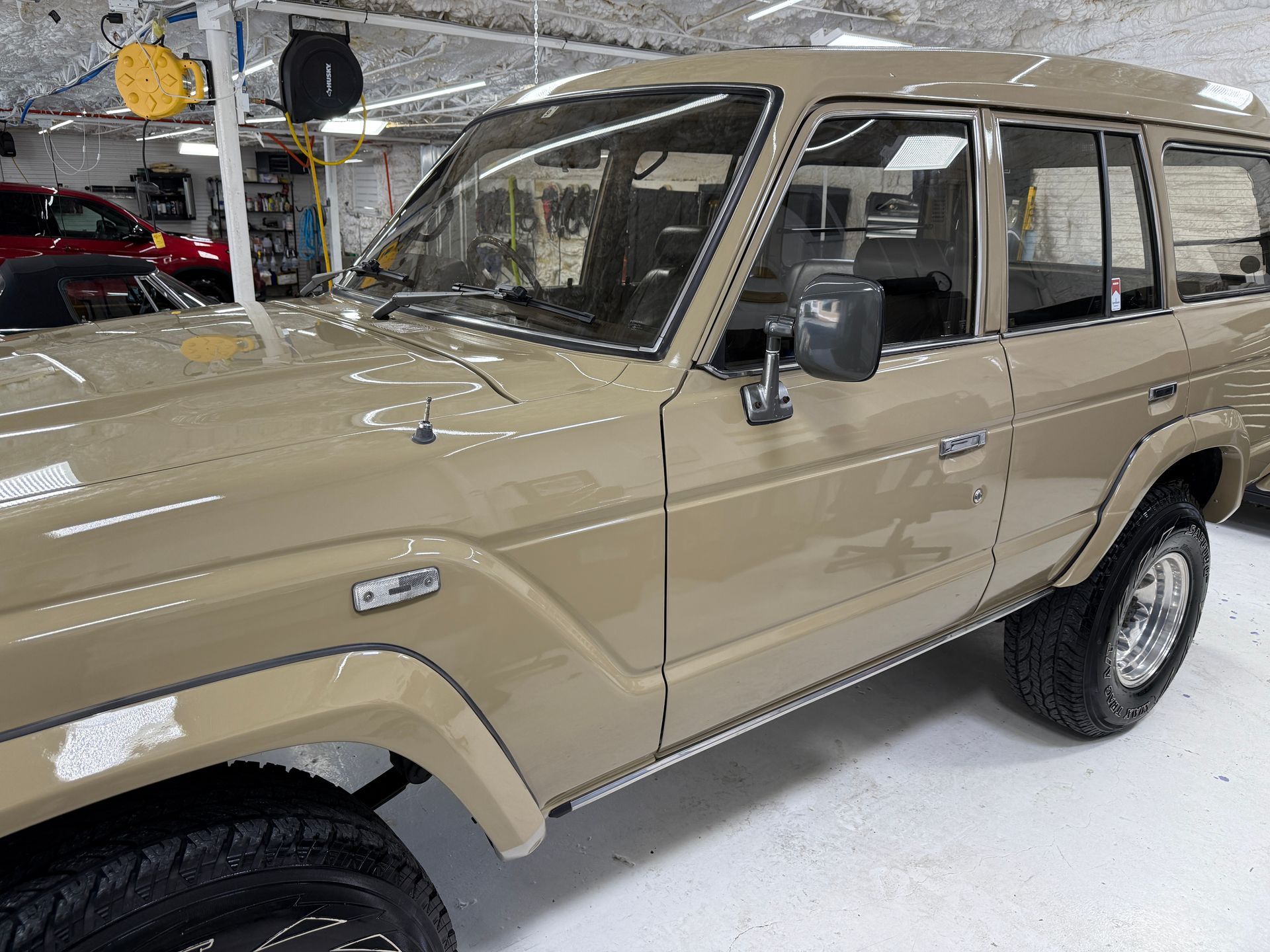 Paint protection film applied to a new car in Durham, shielding the front bumper from debris, scratches, and UV damage to maintain factory finish.