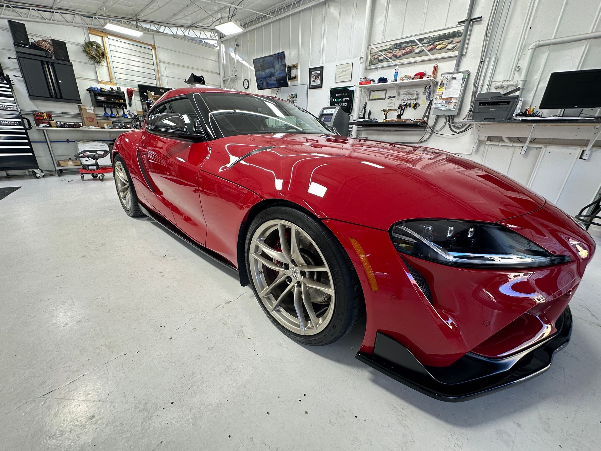 Luxury vehicle in Durham receiving professional paint protection film application to preserve finish