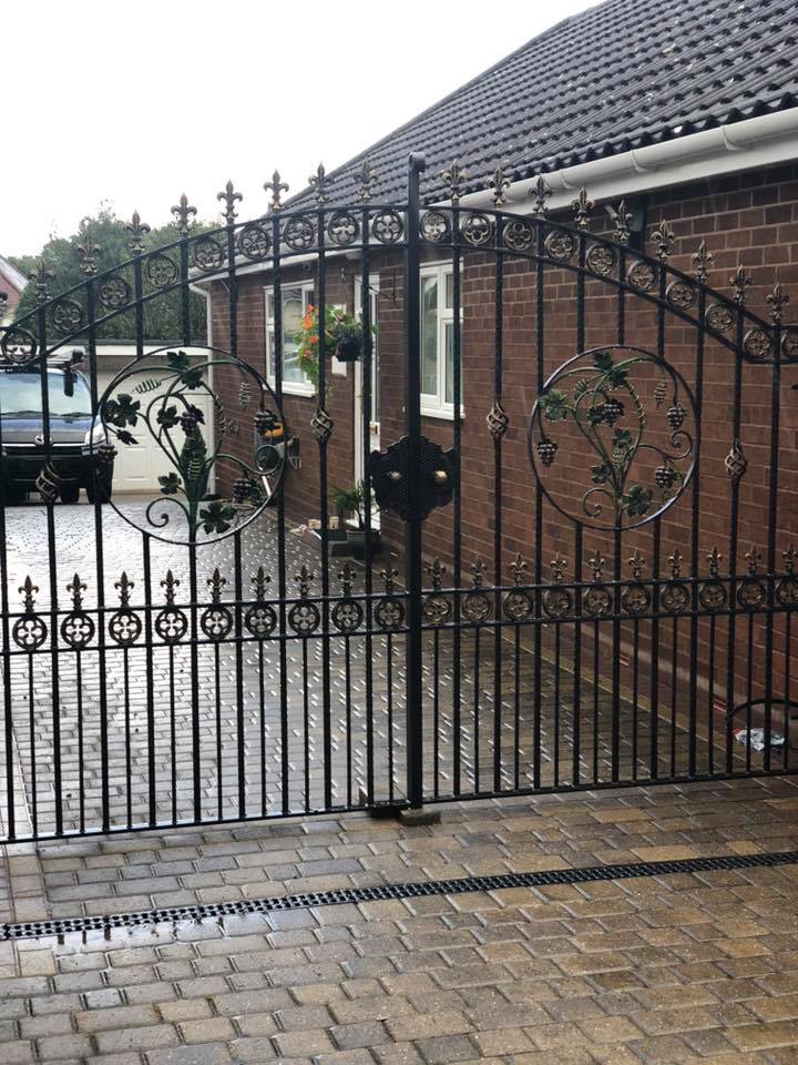 Gates with metal grapevines